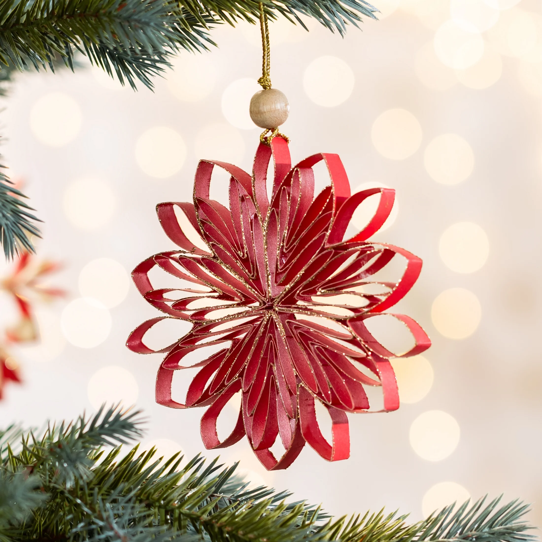 Ozdoba choinkowa gwiazda betlejemska w stylu eko zdobiona delikatnymi drobinkami brokatu | eurofirany