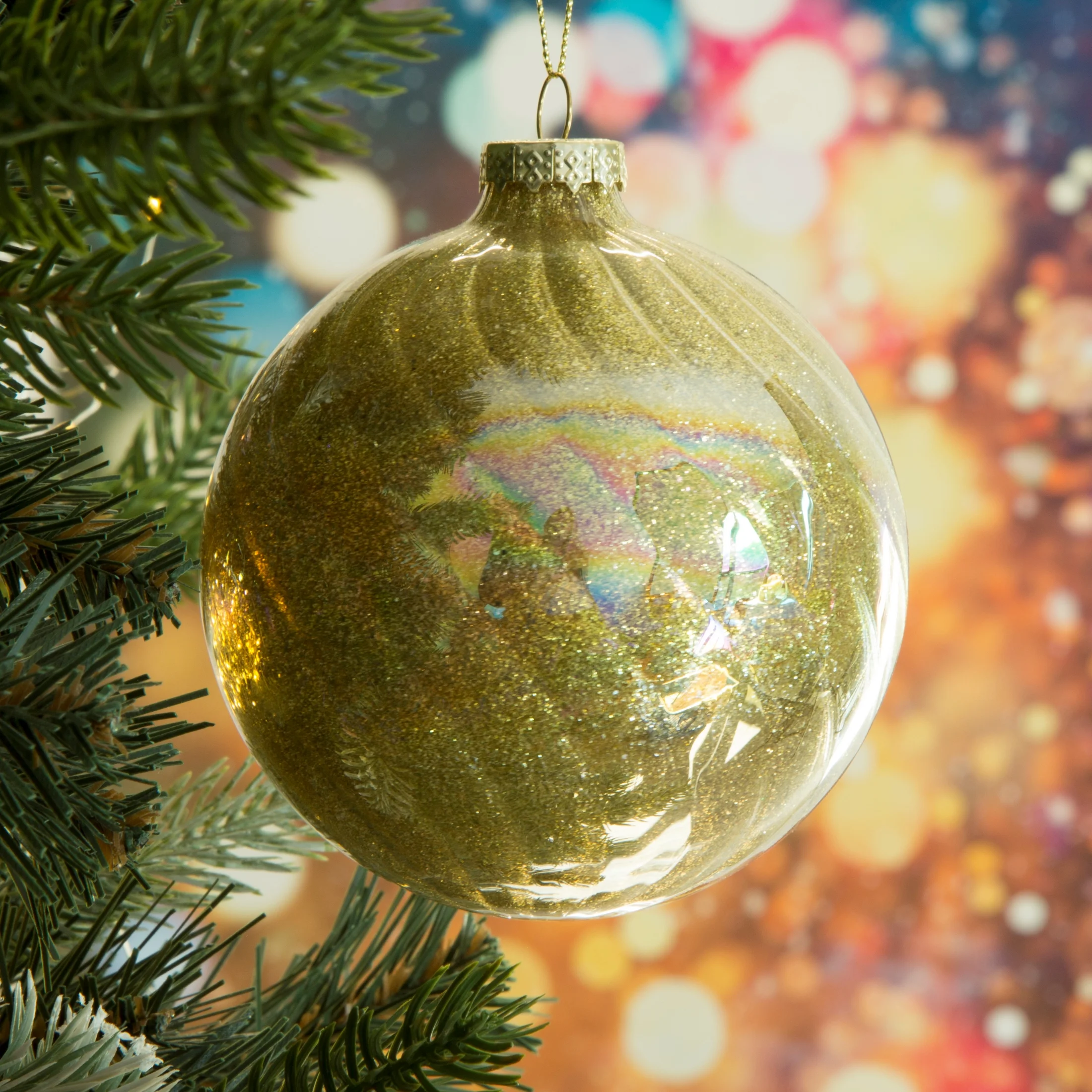 Bombka szklana dekorowana w środku złotym brokatem | eurofirany