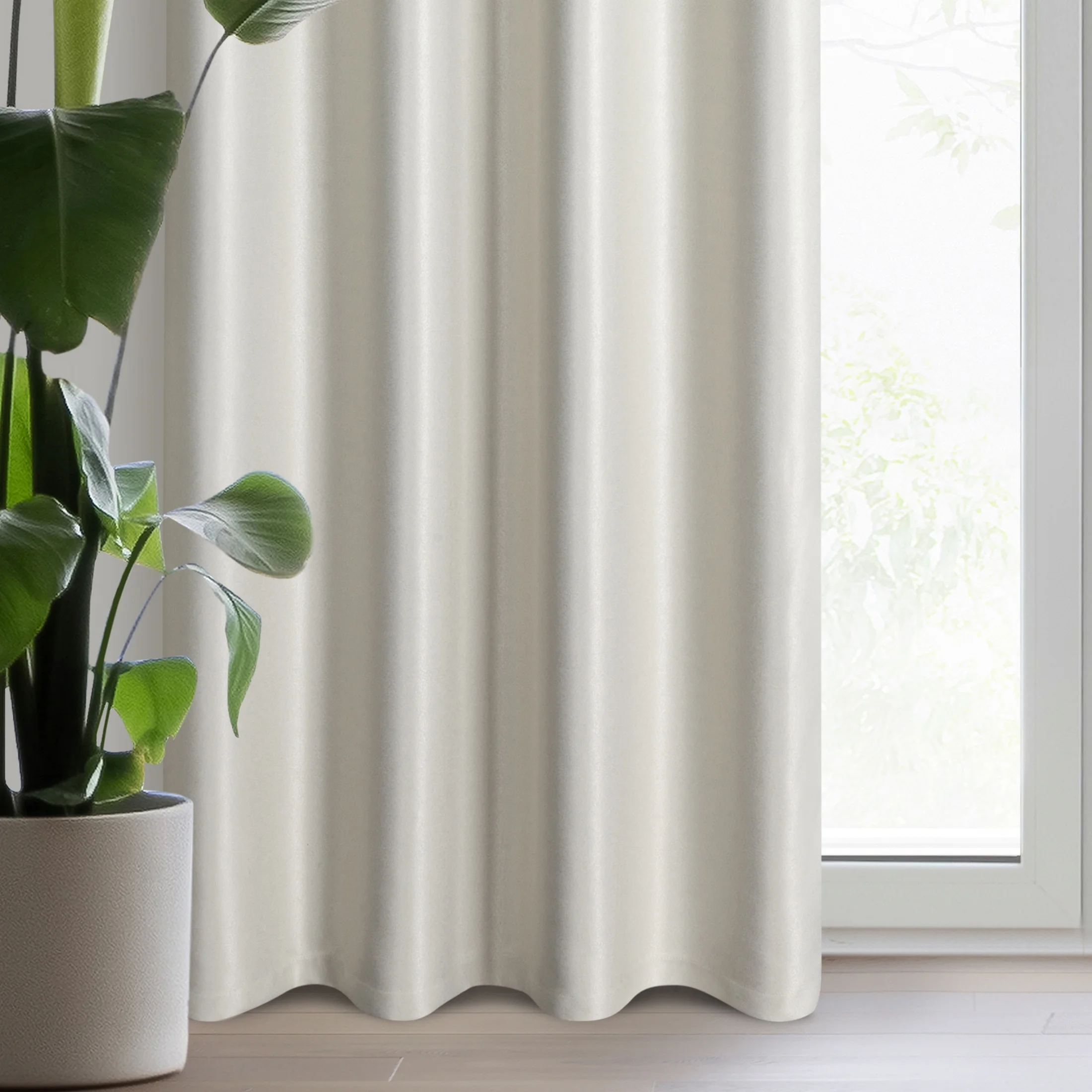 Zasłona kremowa z błyszczącą nicią z tkaniny zaciemniającej 140x250 cm przelotka SELINA | eurofirany