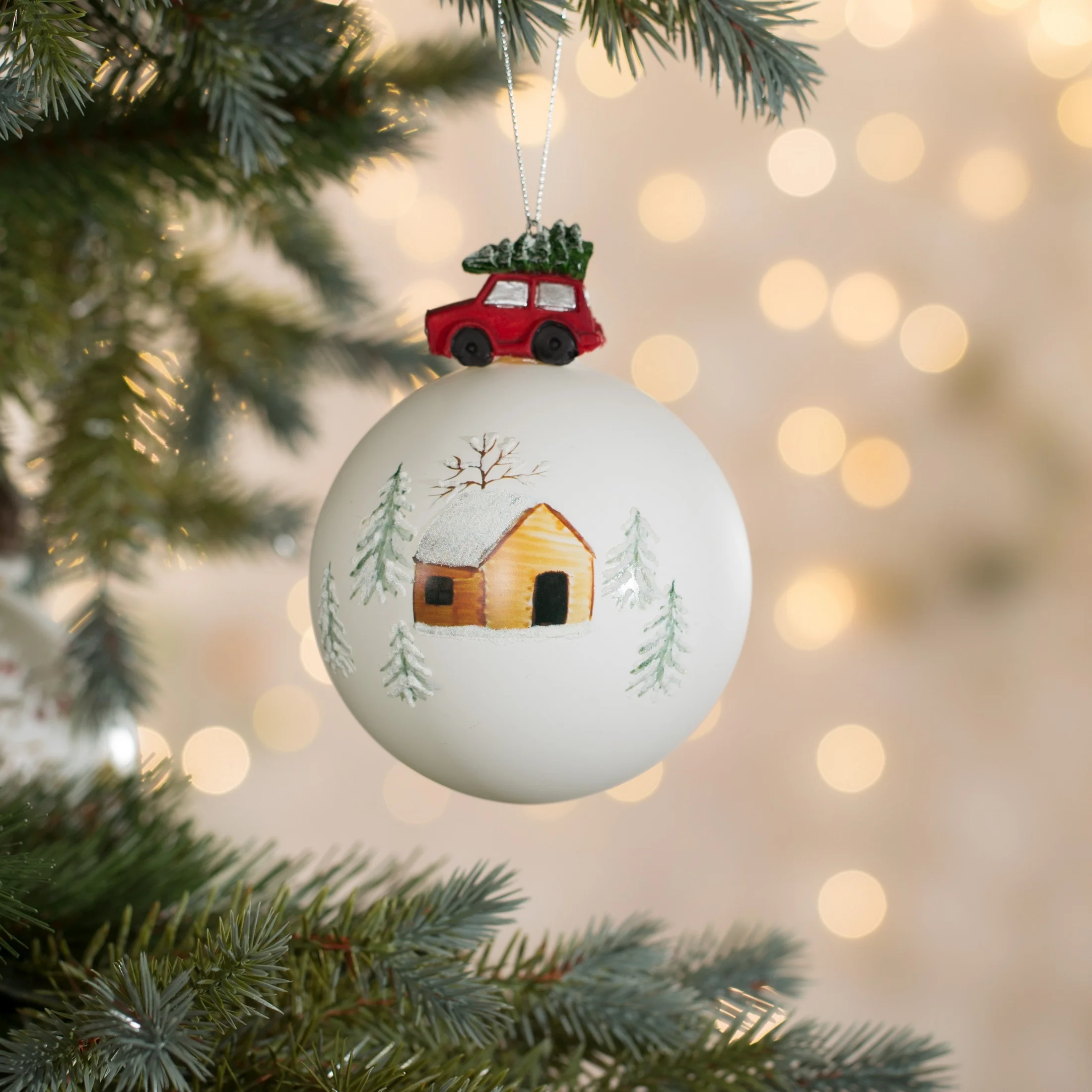 Szklana bombka choinkowa ręcznie zdobiona z szklaną zawieszka w formie autka |