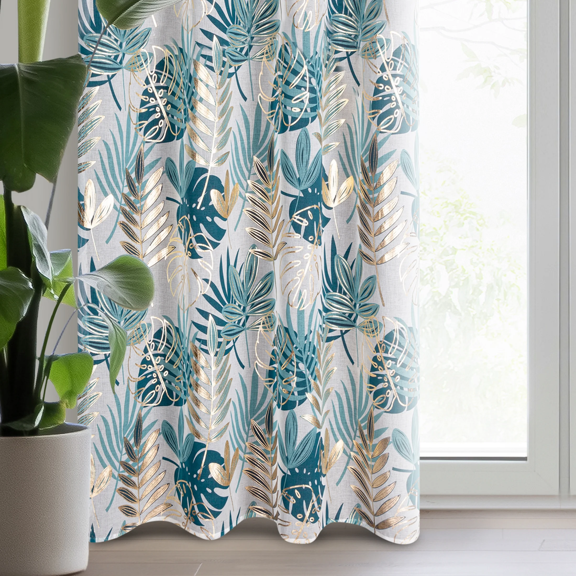 Zasłona z motywem egzotycznych liści podkreślona złocistym nadrukiem 140x250 cm przelotka - KERI | eurofirany