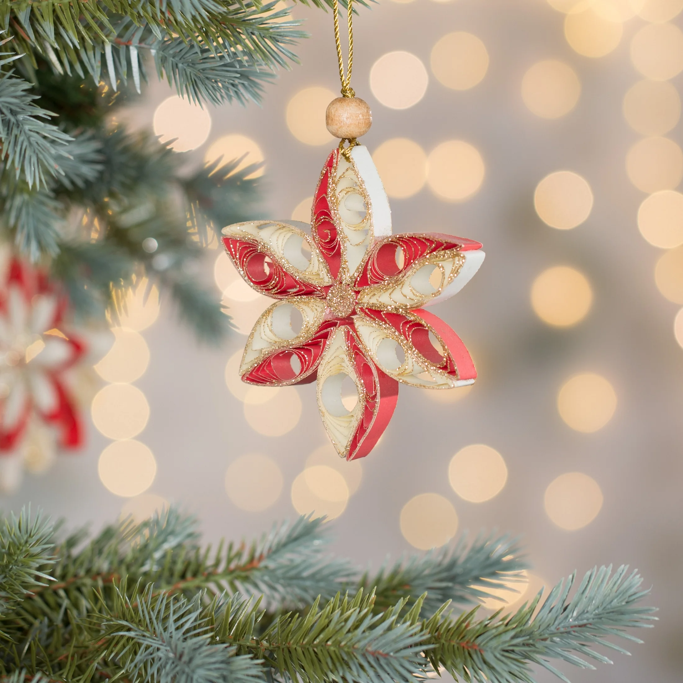 Ozdoba choinkowa gwiazda w stylu eko zdobiona delikatnymi drobinkami brokatu | eurofirany