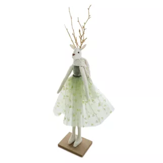 Figurka świąteczna z złotymi rogami i eleganckiej sukience