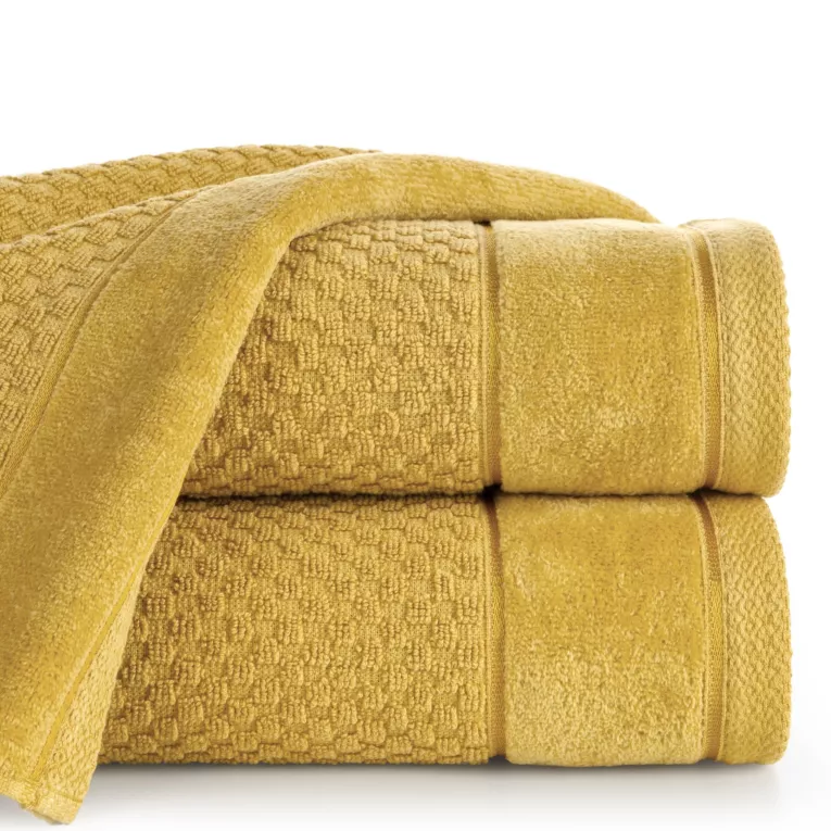 Ręcznik kąpielowy 50x90 cm bawełniany kolor musztardowy o strukturze krateczki z szeroką welurową bordiurą 500 g/m2 FRIDA