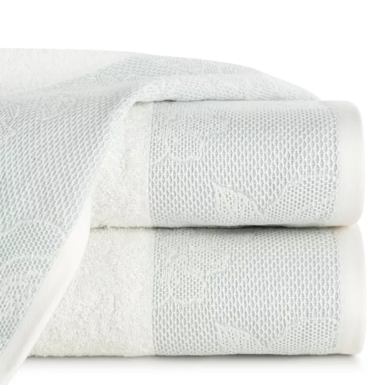 Ręcznik TULIA z żakardową bordiurą z subtelnym kwiatowym wzorem