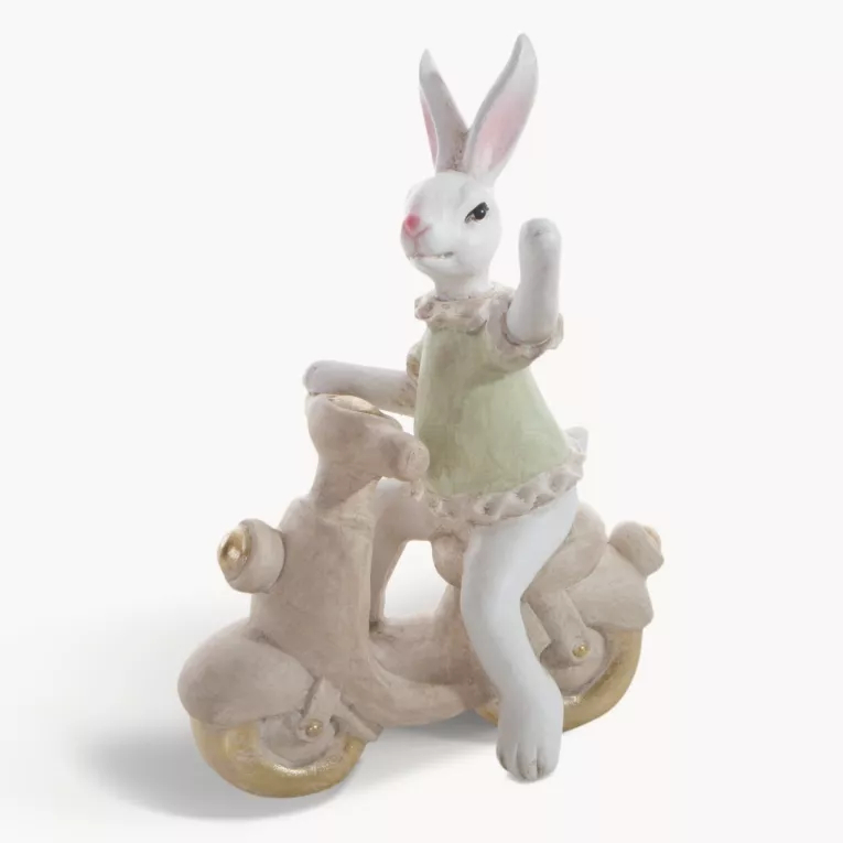 Wielkanocna figurka dekoracyjna uroczego zajączka na skuterku w miętowo, beżowej kolorystyce