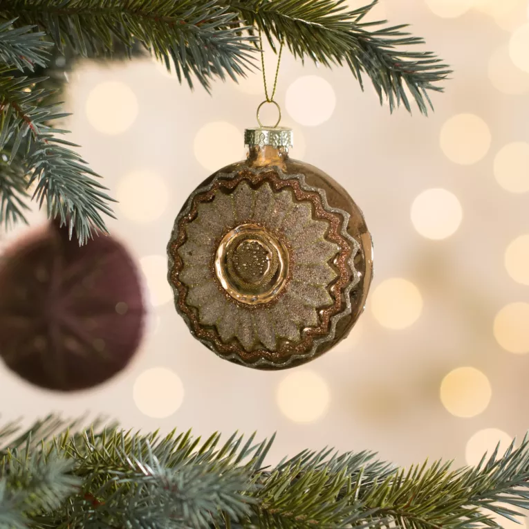 Szklana bombka w formie medalionu ręcznie zdobiona lśniącym kwiatkiem