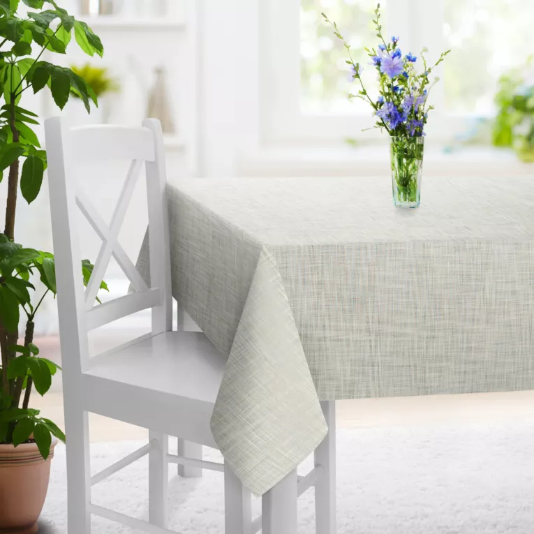 Obrus szyty kremowy z tkaniny w stylu eko o naturalnym splocie, z efektem melanżu, wykończona obciążnikiem