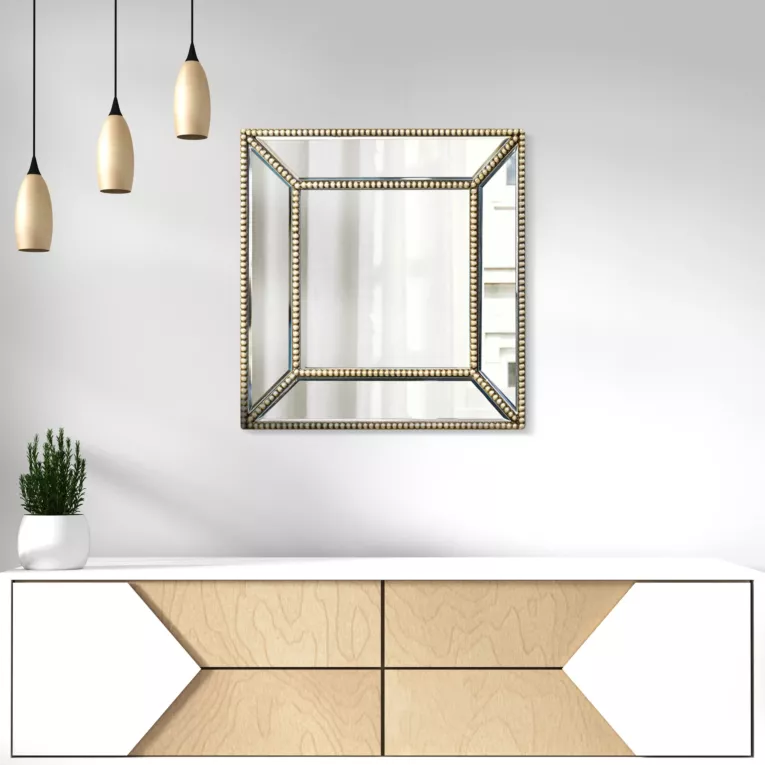 Lustro w dekoracyjnej ramie z geometrycznych elementów