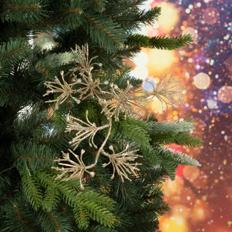 Gałązka świąteczna obsypana złotym brokatem