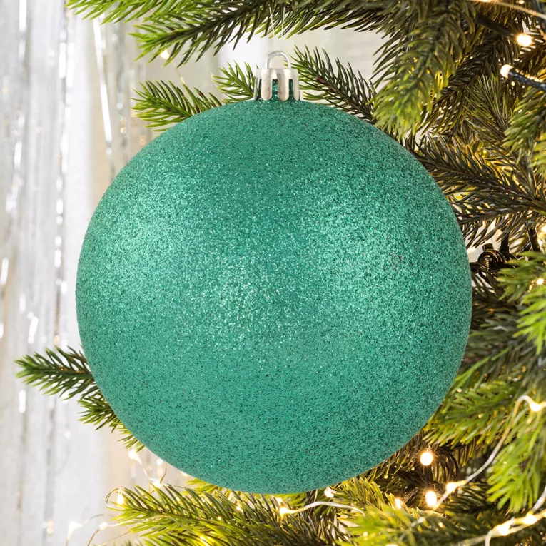Bombka choinkowa obsypana lśniącym brokatem