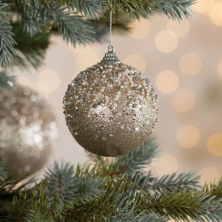 Bombka choinkowa zdobiona brokatem i drobnymi koralikami