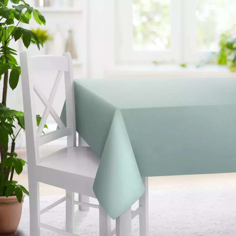 Obrus szyty GEONOA miętowy z miękkiej tkaniny o naturalnym charakterze z widocznym ozdobnym splotem