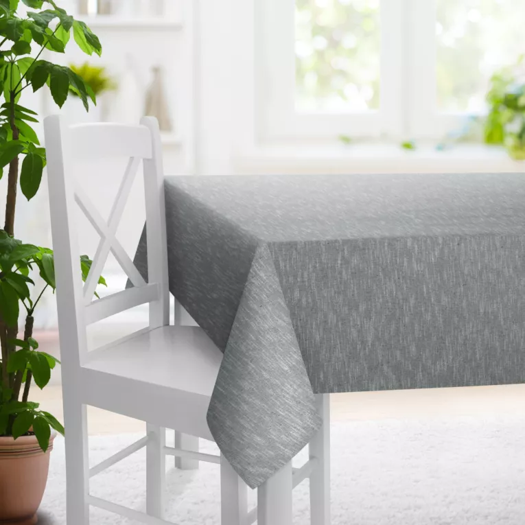 Obrus szyty popielaty z matowej luźnotkanej tkaniny z efektem melanżu, wykończona obciążnikiem