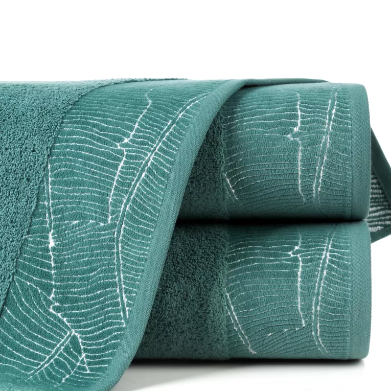 Ręcznik METALIC z  żakardową bordiurą z motywem liści bananowca wykonanym srebrną nicią