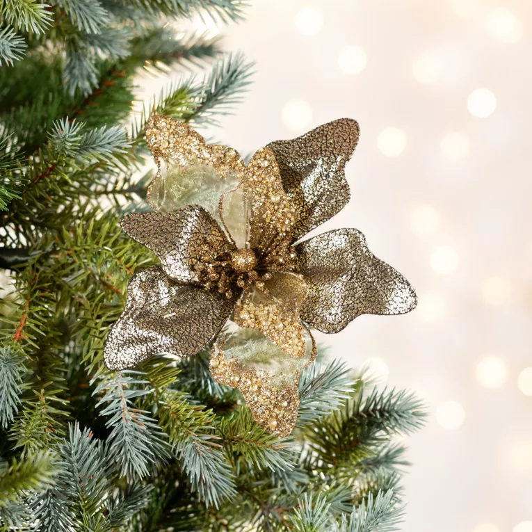 Świąteczny kwiat choinkowy z lśniącymi akcentami