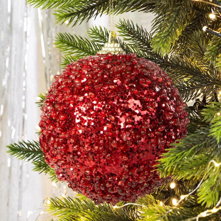 Bombka choinkowa zdobiona brokatem i drobnymi koralikami