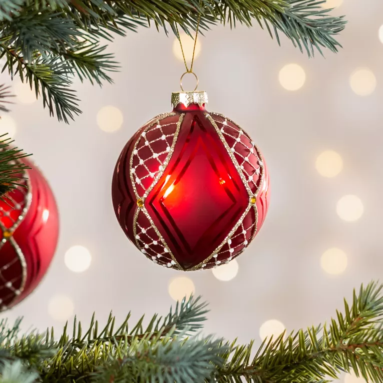 Szklana bombka choinkowa ręcznie zdobiona błyszczącym wzorem