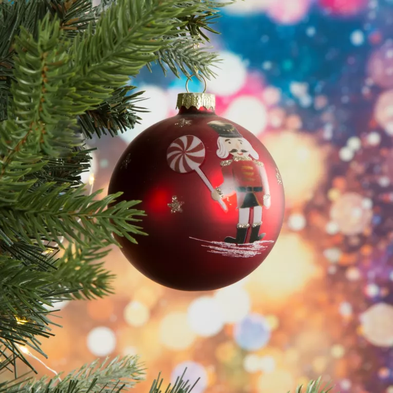 Bombka szklana ręcznie zdobiona wzorem dziadka do orzechów z dodatkiem błyszczącego brokatu