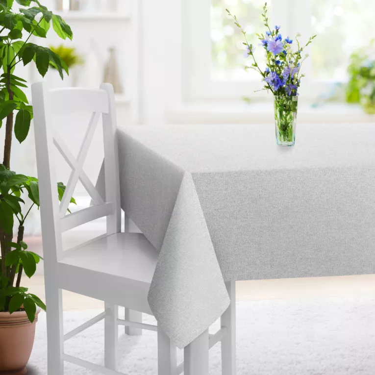 Obrus szyty kremowo srebrny z tkaniny o strukturze siatki z efektem melanżu