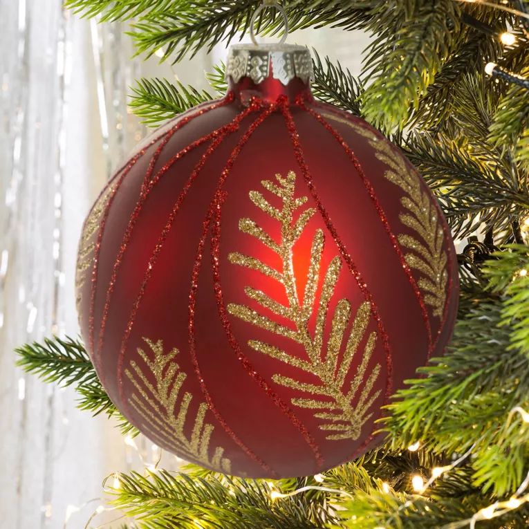 Bombka szklana ręcznie zdobiona brokatowym motywem gałązek