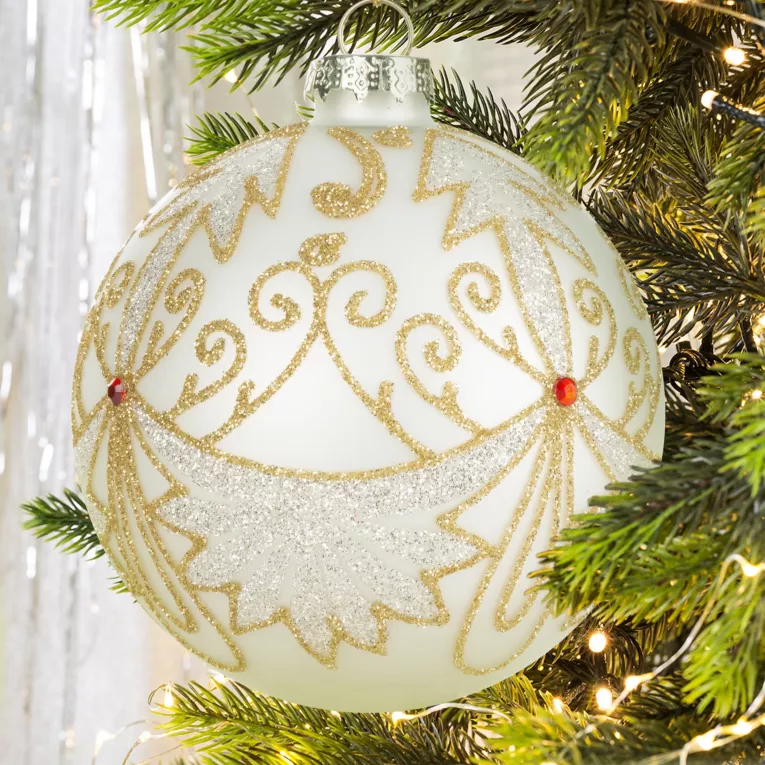 Bombka szklana biała ręcznie zdobiona złotym brokatem i czerwonymi kryształkami