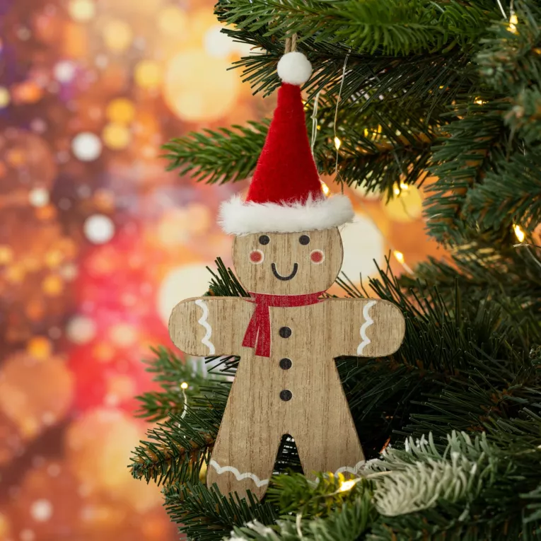 Ozdoba choinkowa w kształcie ludzika z piernika z czapeczką Mikołaja w stylu eko