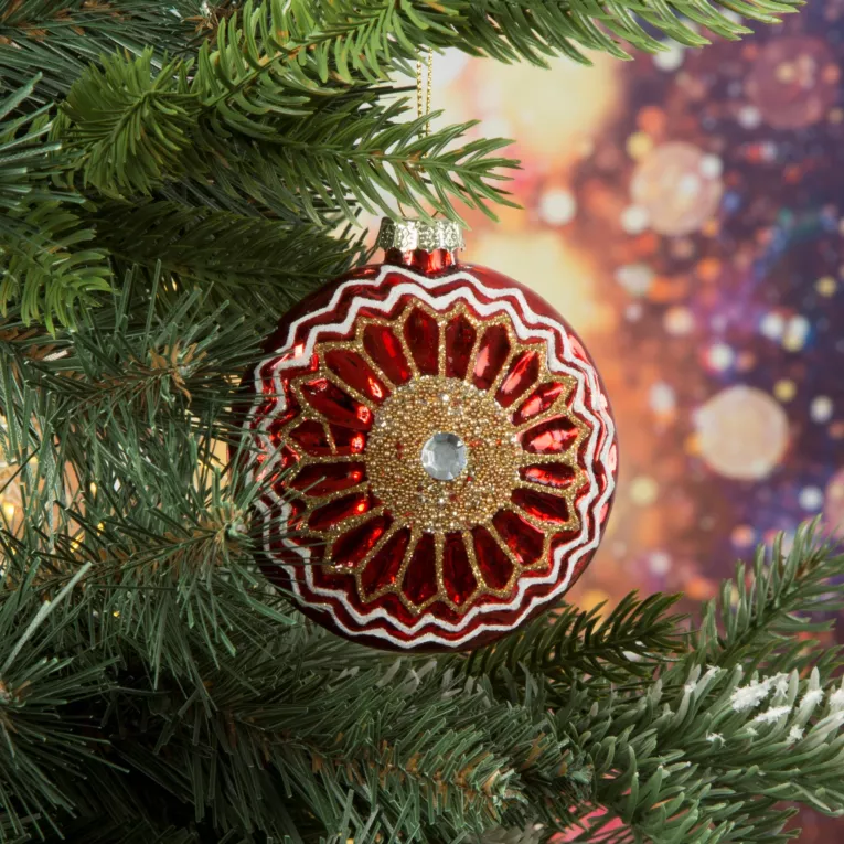 Szklana bombka w formie medalionu z wytłaczanym wzorem i kryształem