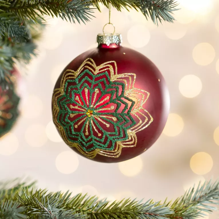 Szklana bombka choinkowa ręcznie zdobiona błyszczącym wzorem