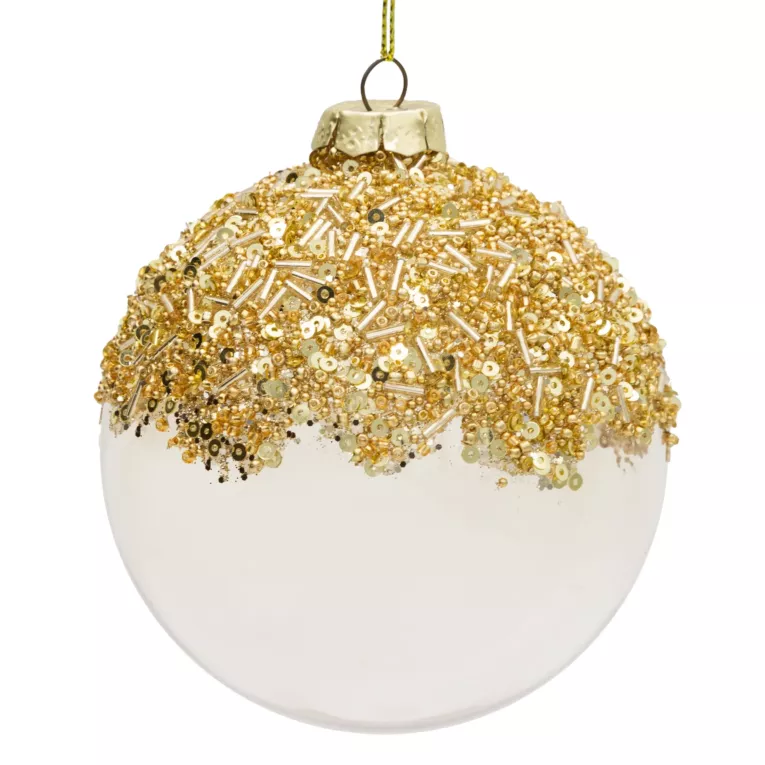 Szklana bombka choinkowa zdobiona złotymi koralikami
