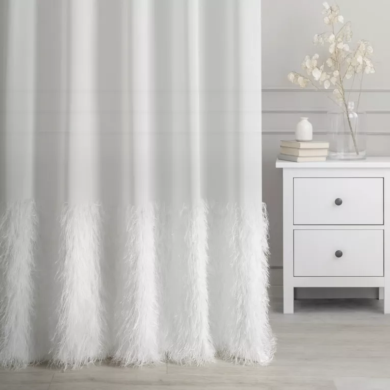 Firana szyta na taśmie fala EVAN kremowa z matowej tkaniny z szerokim pasem zwiewnych frędzli Italissima Eva Minge