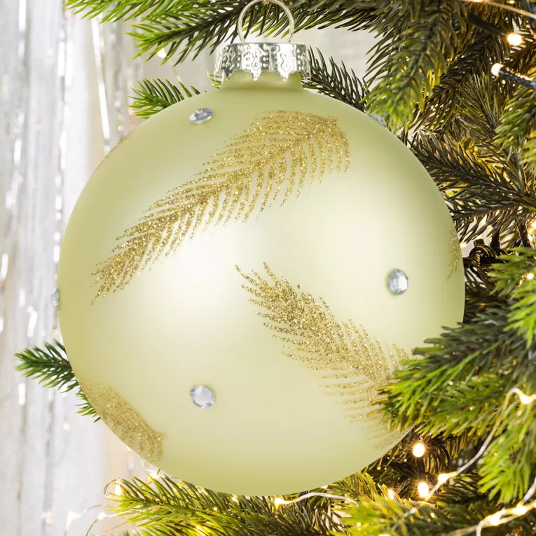 Bombka choinkowa ręcznie zdobiona motywem złotych piór i kryształków
