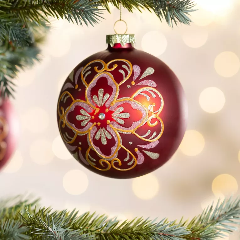 Szklana bombka choinkowa ręcznie zdobiona błyszczącym wzorem