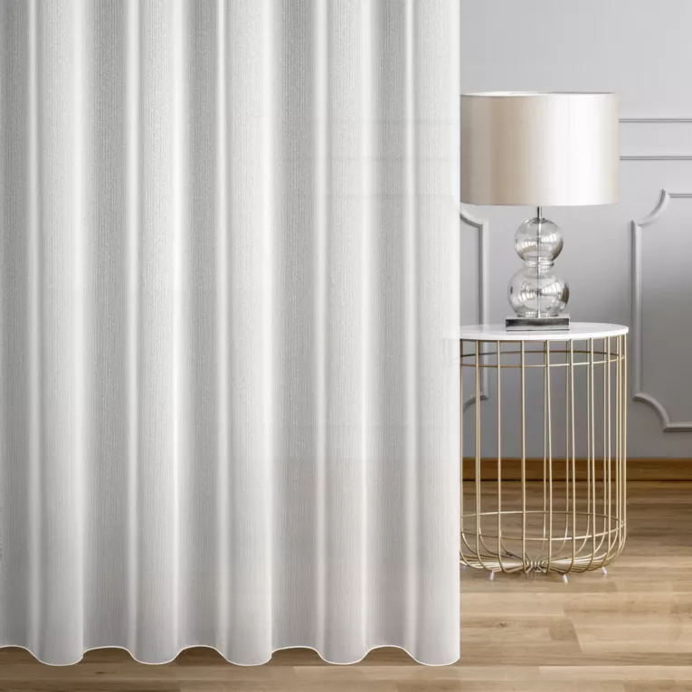 Firana szyta na taśmie 5 cm TANYA kremowa matowa z efektem drobnych pionowych nitek, wykończona obciążnikiem