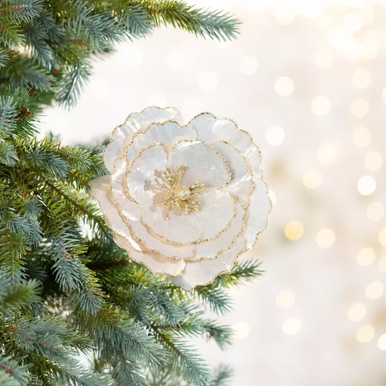 Świąteczny kwiat choinkowy z lśniącymi akcentami