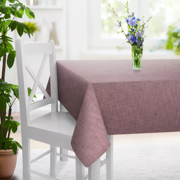 Obrus szyty pudrowo różowy o naturalnym, luźnym splocie w stylu eko