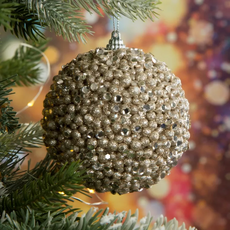 Bombka choinkowa z drobnych kuleczek obsypana lśniącym brokatem i kryształkami