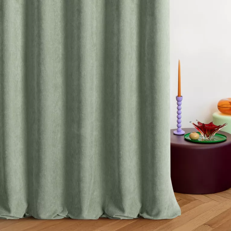 Zasłona szyta na przelotkach ciemnomiętowa z tkaniny o szenilowej strukturze