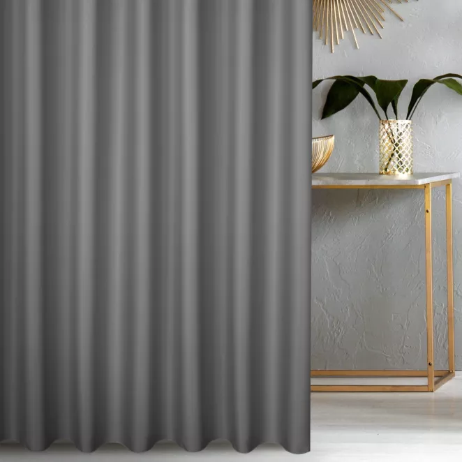 Zasłona szyta na taśmie 5 cm popielata z gładkiej tkaniny zaciemniającej typu dimout wykończona obciążnikiem