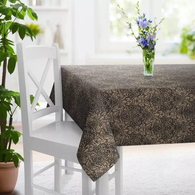 Obrus szyty grafitowo złocisty z połyskującej tkaniny zdobionej eleganckim wzorem Pierre Cardin