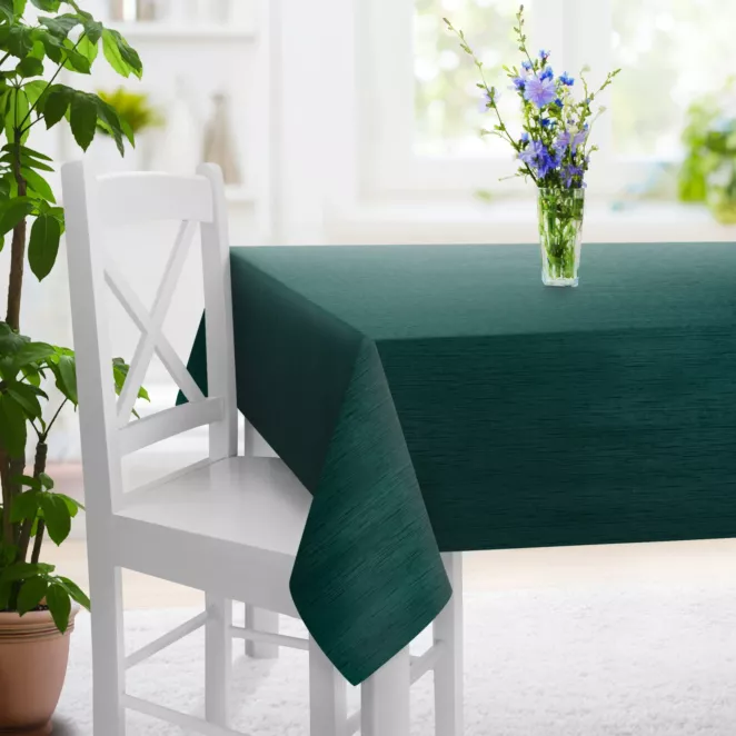 Obrus szyty turkusowy z tkaniny welwetowej w pionowe prążki, wykończona obciążnikiem