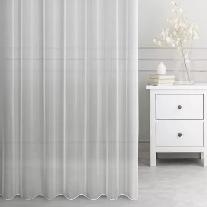 Firana szyta na taśmie 5 cm RAMIRA kremowa z wysokogatunkowego niemieckiego woalu, wykończona obciążnikiem