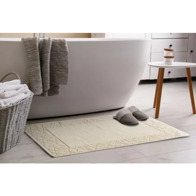 Dywanik łazienkowy NIKA z bawełny zdobiony geometrycznym wzorem