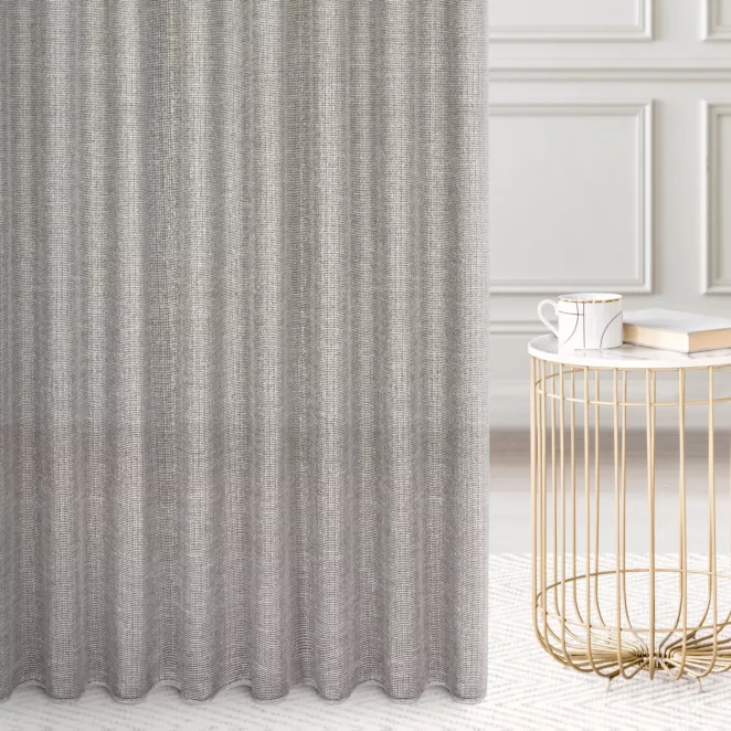 Firana szyta na taśmie 5 cm popielato złocista z delikatnej siateczki przetykanej błyszczącą, lureksową nicią wykończona obciążnikiem