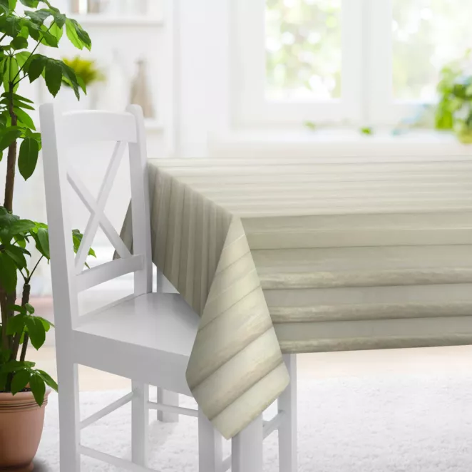 Obrus szyty kremowo złoty z szenilowej tkaniny w pionowe pasy przetykane błyszczącą nicią