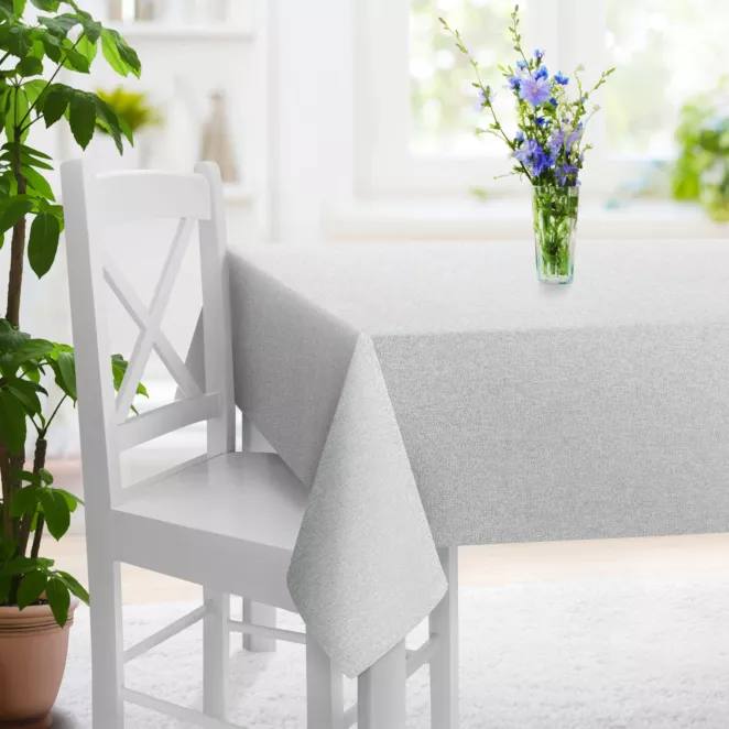 Obrus szyty kremowo srebrny z tkaniny o strukturze siatki z efektem melanżu