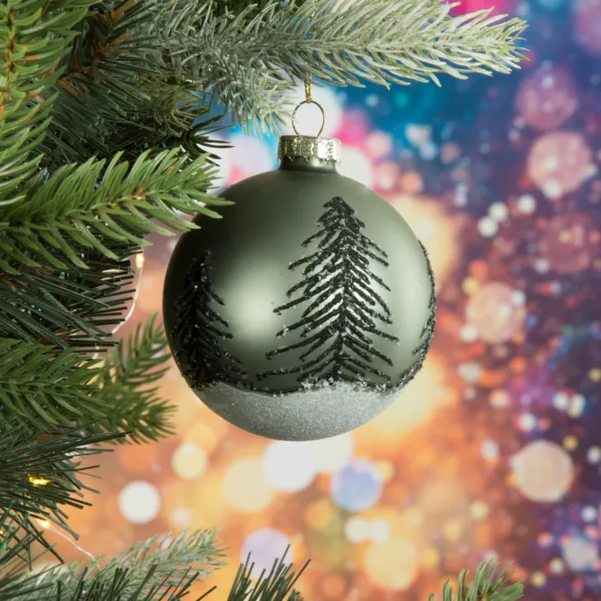 Bombka szklana ręcznie zdobiona brokatowym wzorem zimowego pejzażu