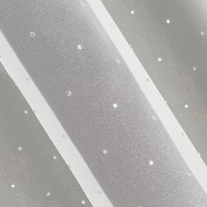 M141/2 Firana szyta na taśmie 5 cm AVILLA kremowa ekskluzywna zdobiona szerokim pasem błyszczących kryształków Italissima Eva Minge