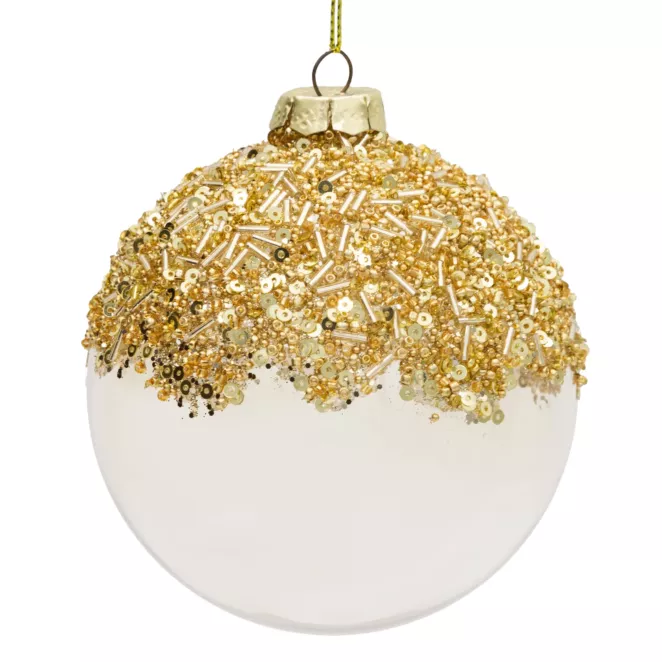 Szklana bombka choinkowa zdobiona złotymi koralikami