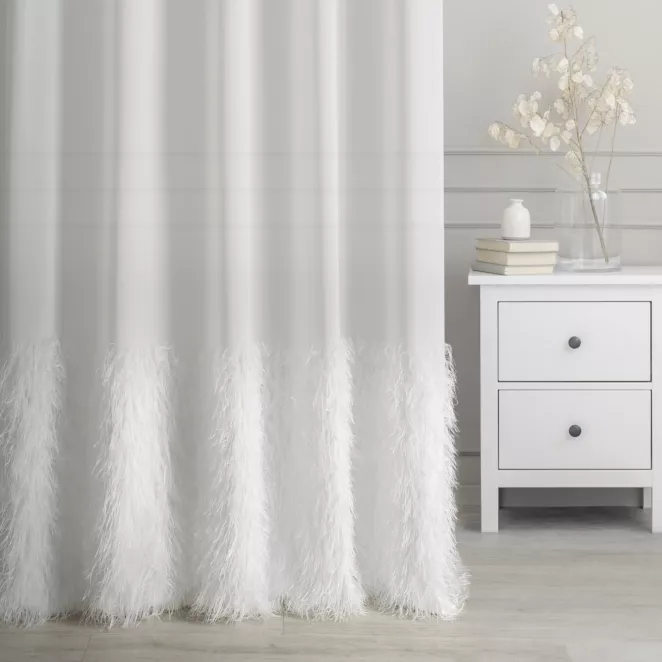 Firana szyta na taśmie 5 cm EVAN kremowa z matowej tkaniny z szerokim pasem zwiewnych frędzli Italissima Eva Minge